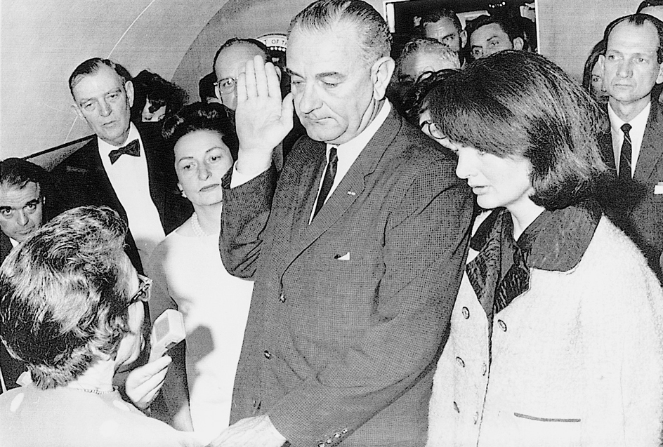 President Johnson takes the oath of office