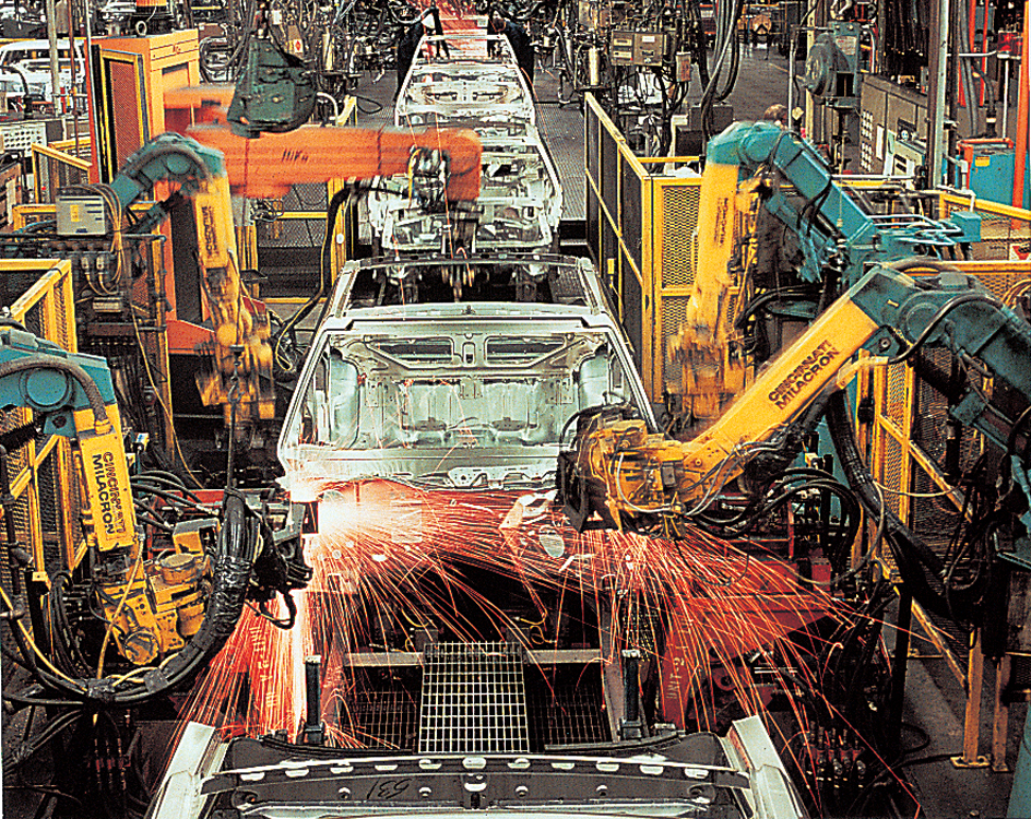 Robots weld car bodies