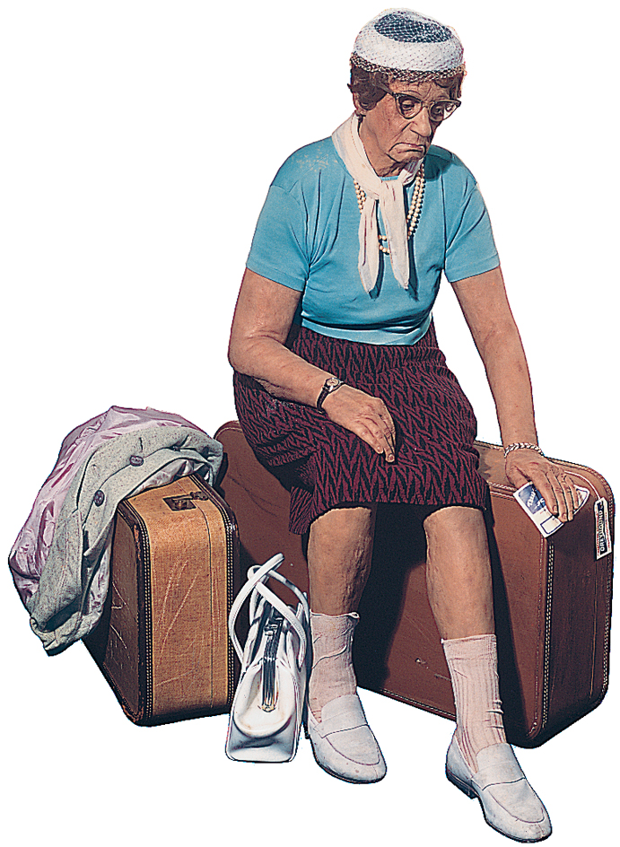 Woman with Suitcases by Duane Hanson