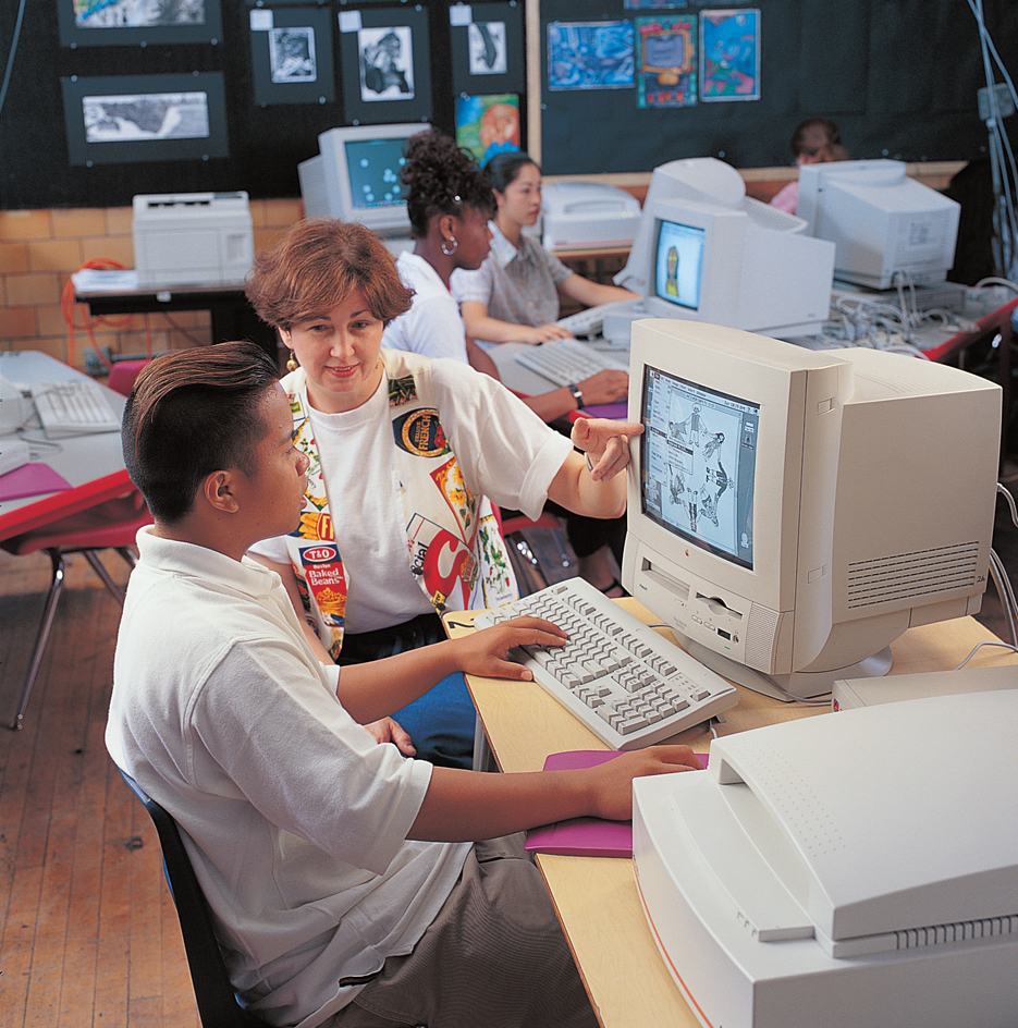 Teachers help students master computers