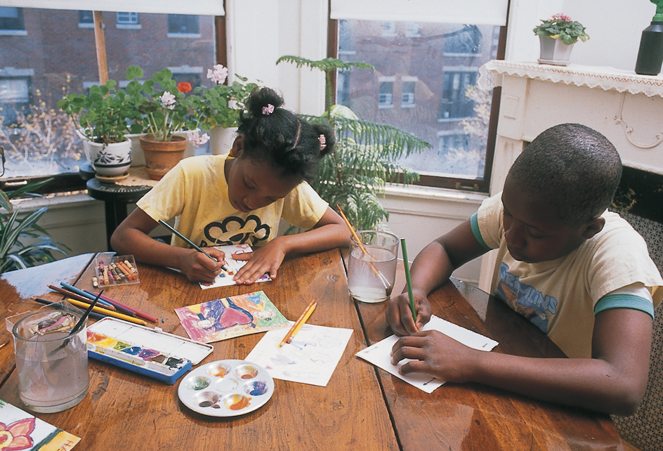 Children using their imagination to create greeting cards