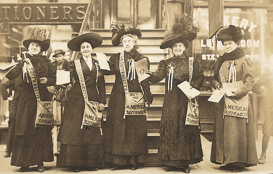 Suffragists selling magazines