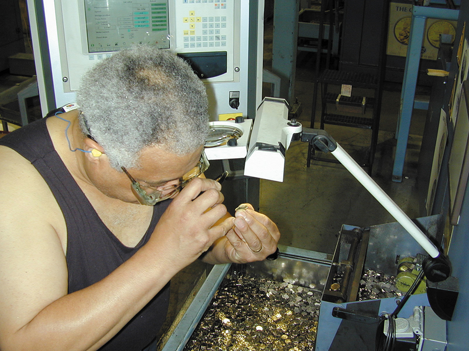 Inspecting newly minted coins