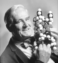 Scientist Donald Cram with DNA model