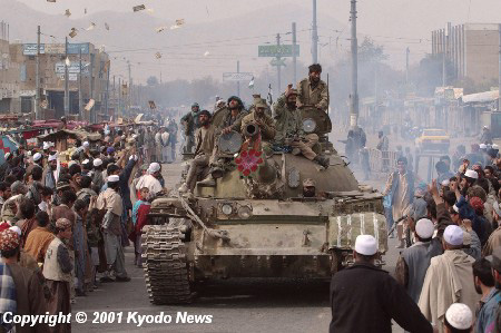 Anti-Taliban forces take Kabul in 2001