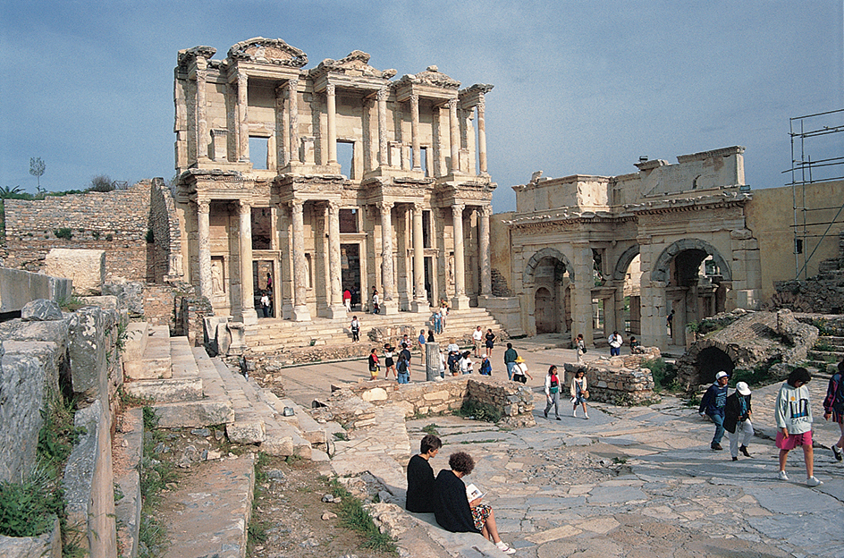 Tourists visiting ruins at Ephesus