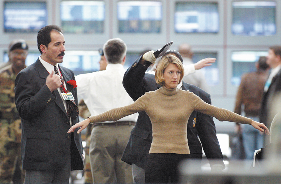 Security check at airport using a handheld scanner