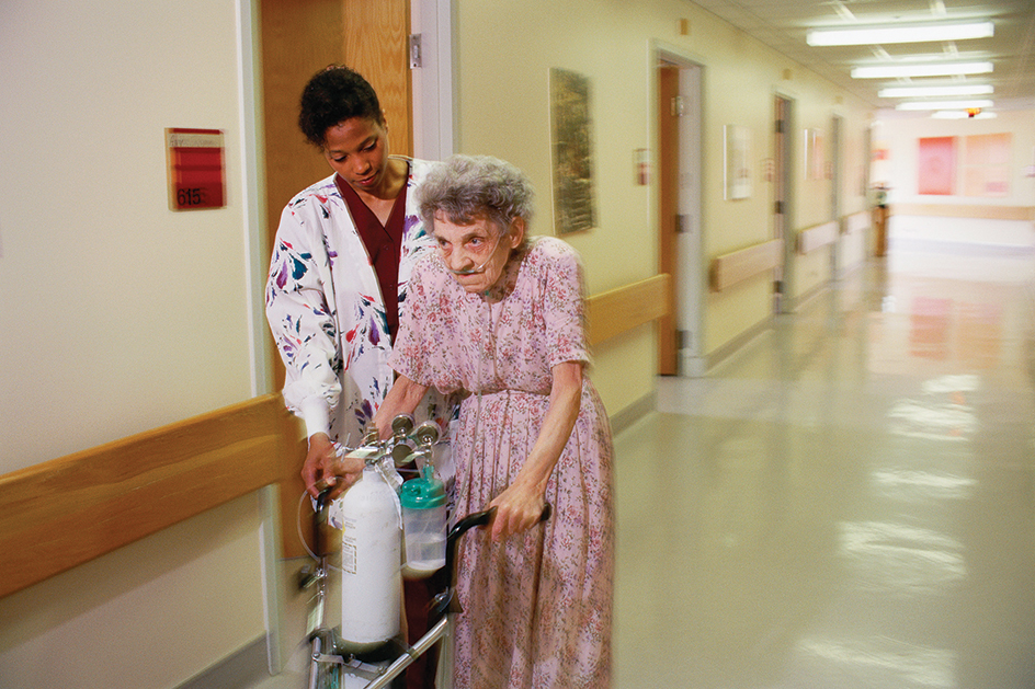 Nursing home resident using a walker