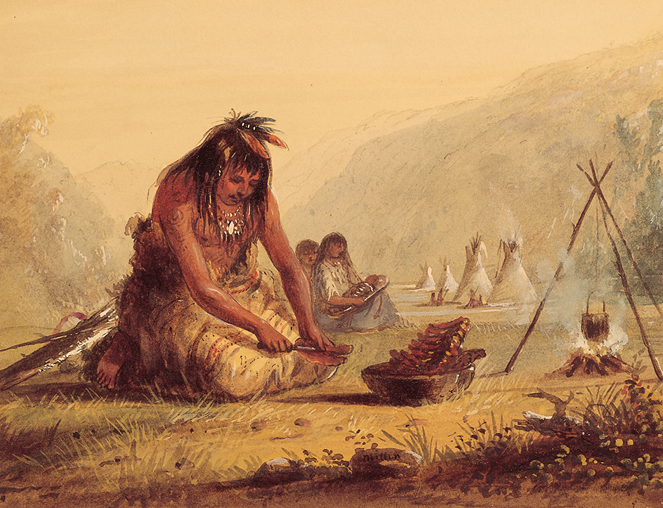 Shoshone man prepares a meal