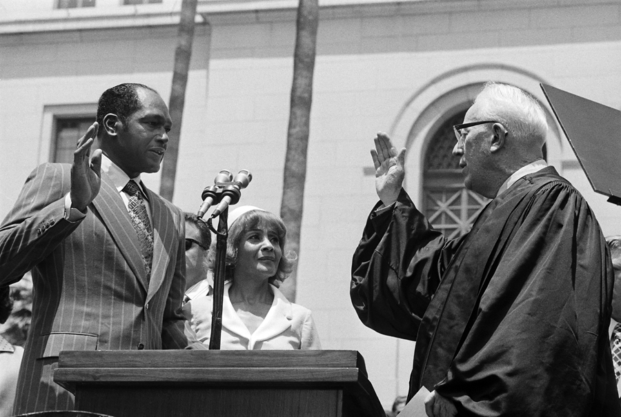 Tom Bradley takes the oath of office