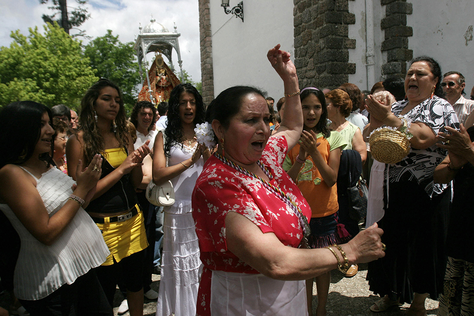 Roma dance during a traditional procession