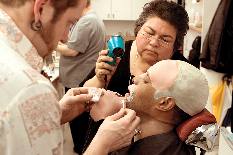 Applying makeup to an actor