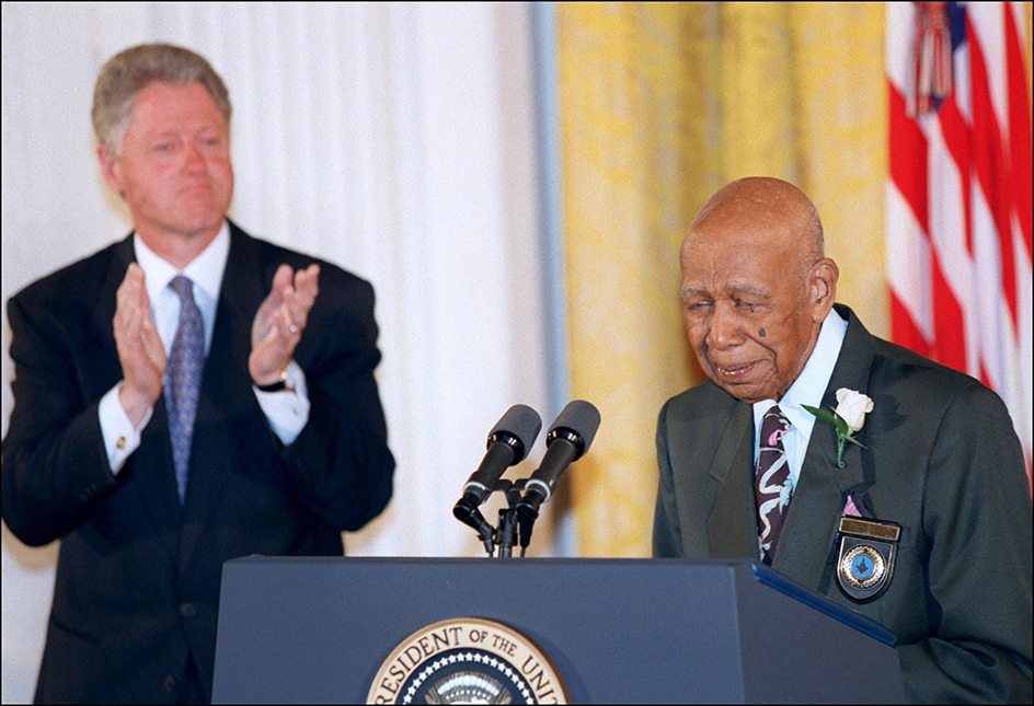 Herman Shaw with Bill Clinton