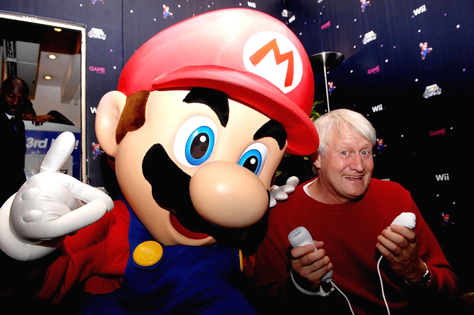 Charles Martinet, the voice of Super Mario, poses with Mario