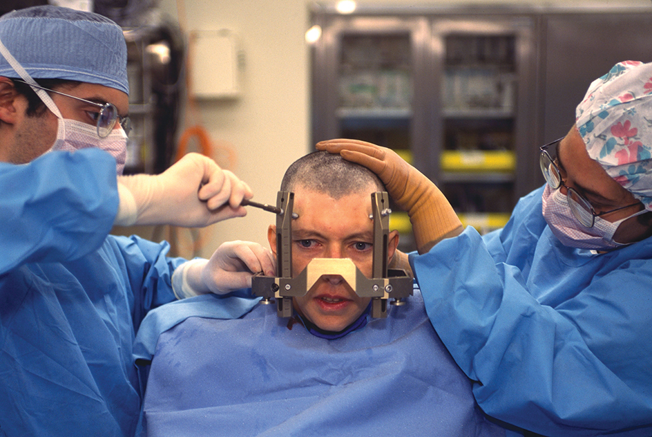 Person undergoing brain surgery