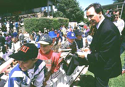 Keating signing autographs