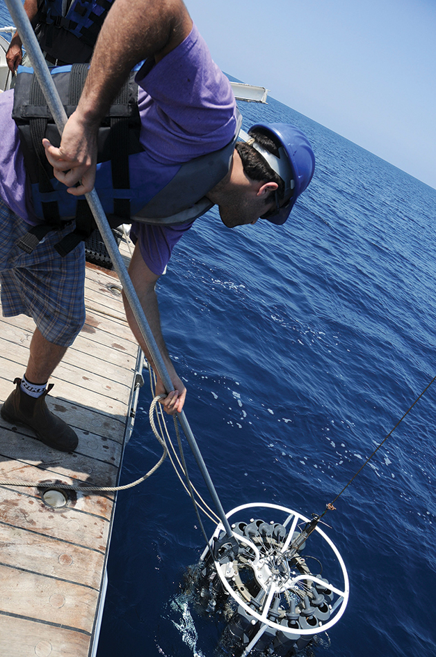 Oceanographer collecting samples