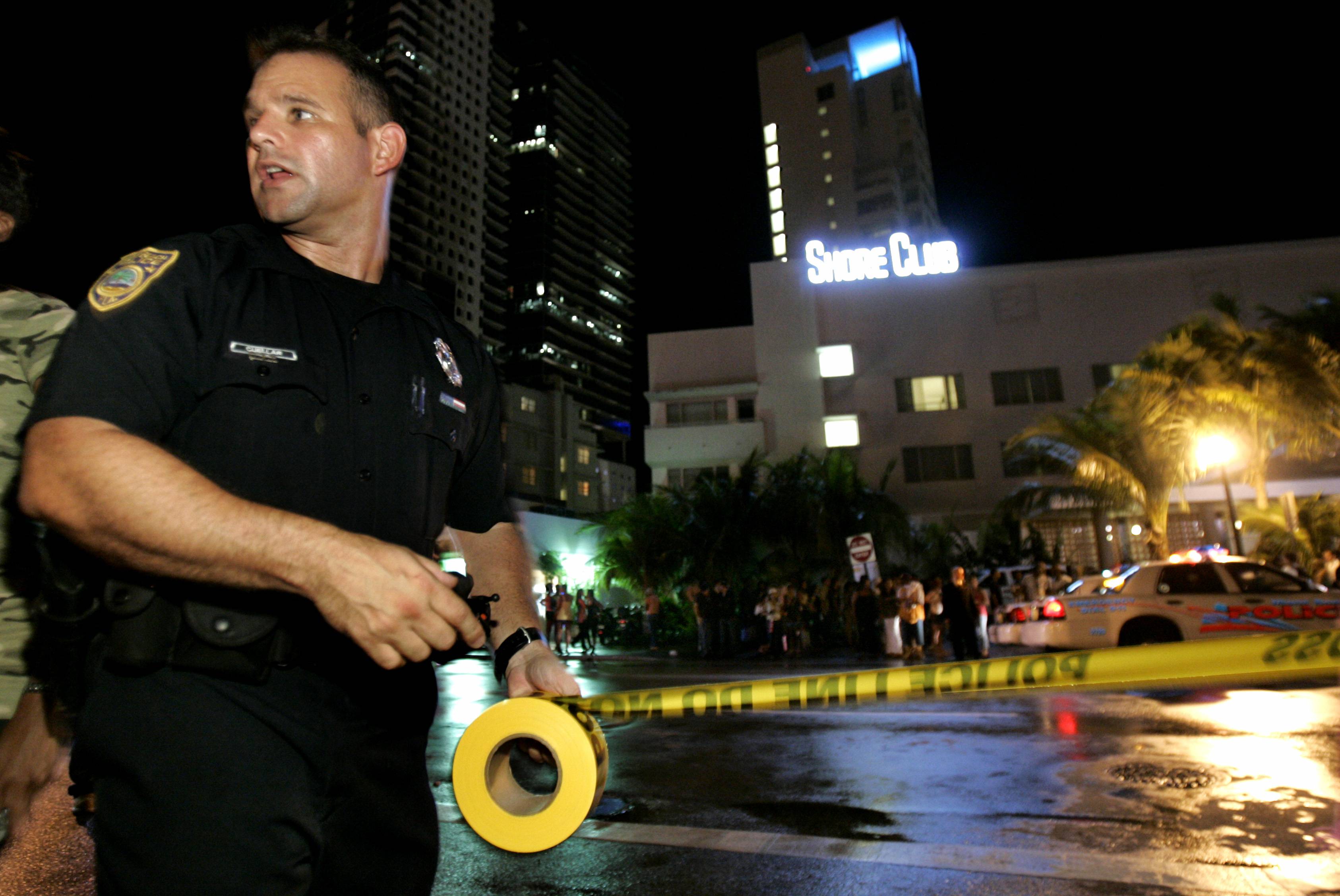 A police officer securing a crime scene