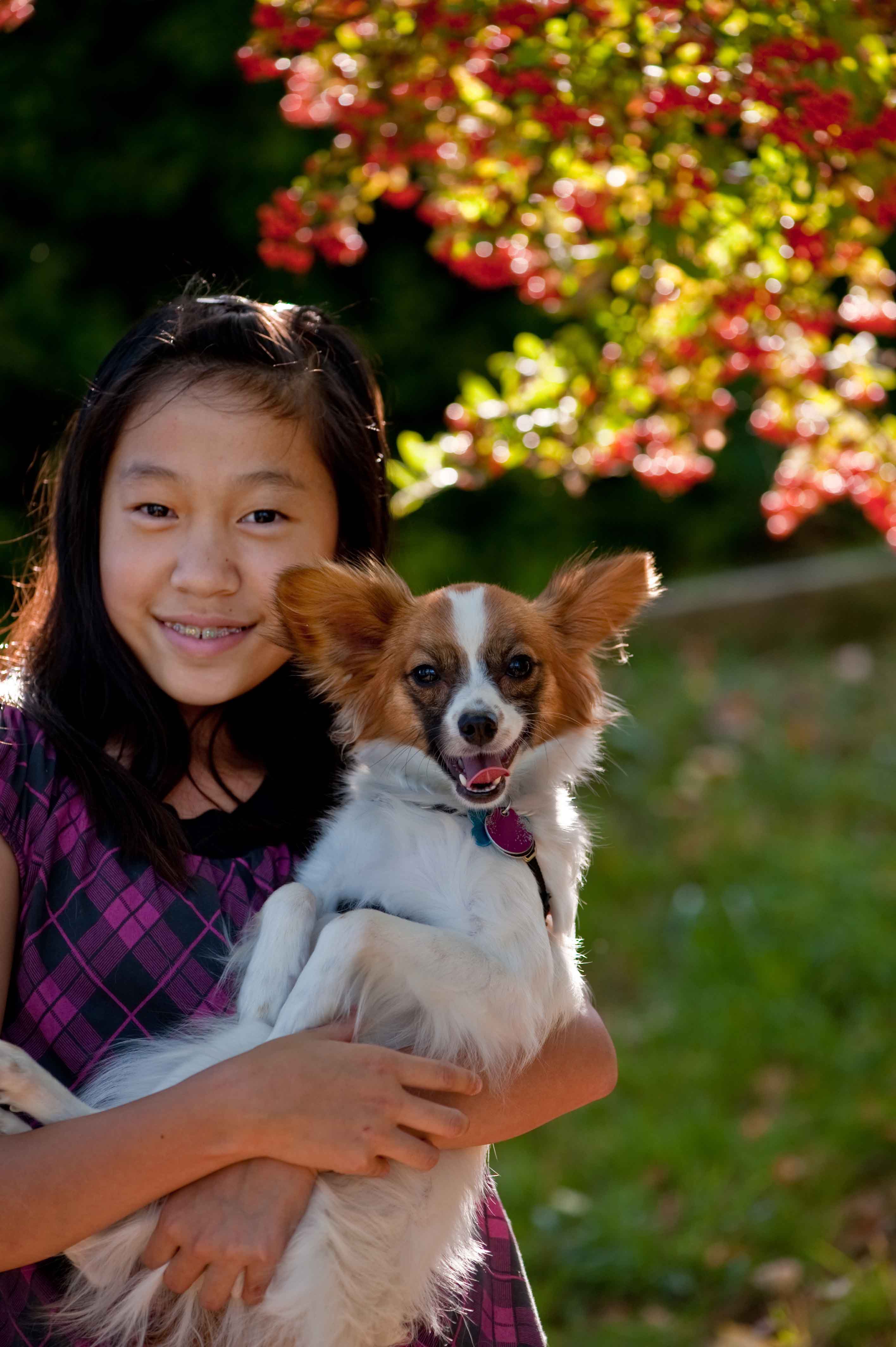 Girl with pet dog