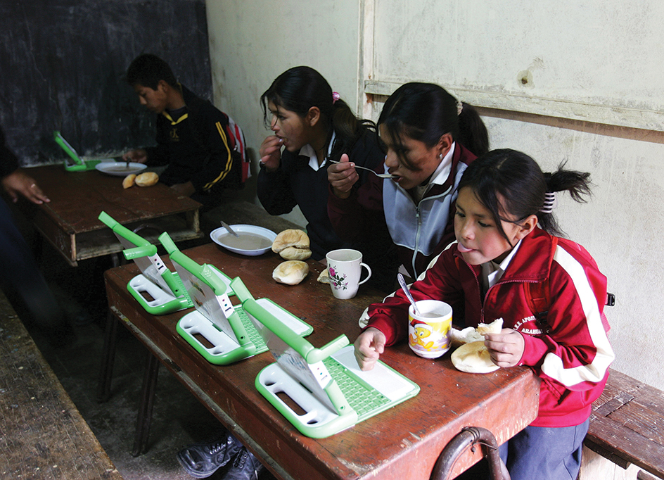 Children studying on laptop computers