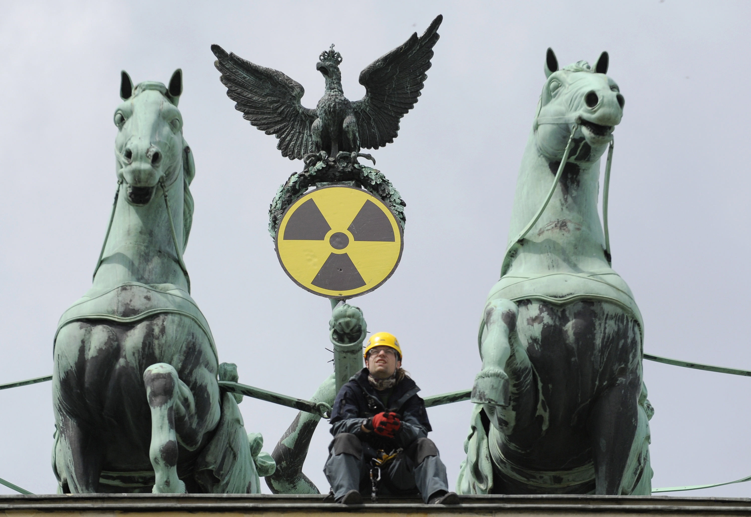 Greenpeace protest atop Brandenburg Gate in Berlin, Germany