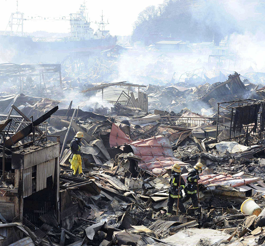 Rescue workers after Japan's earthquake and tsunami