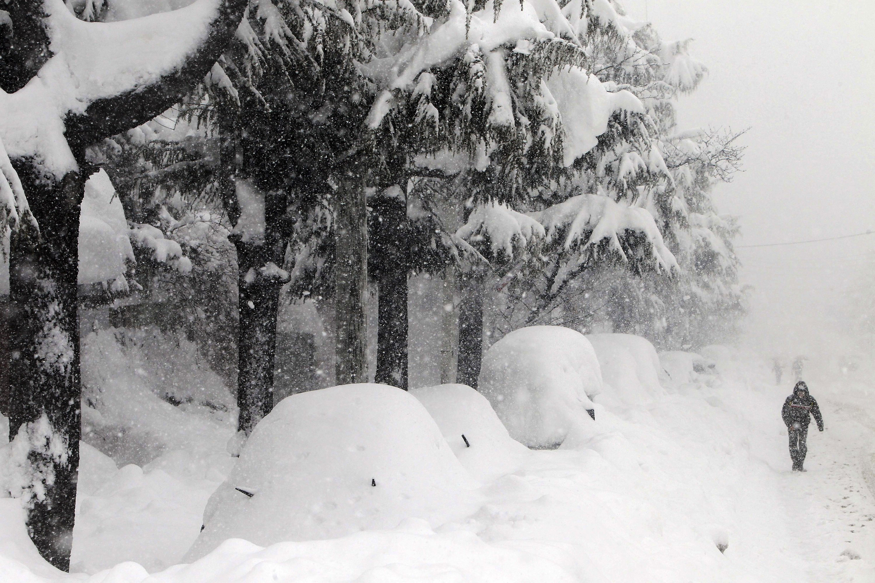 Man walking in a blizzard