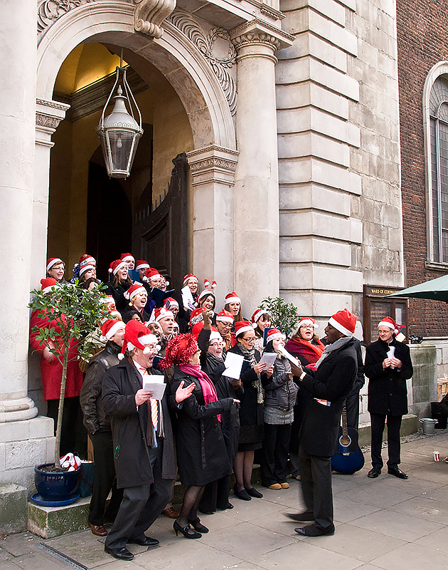 Christmas carolers in London