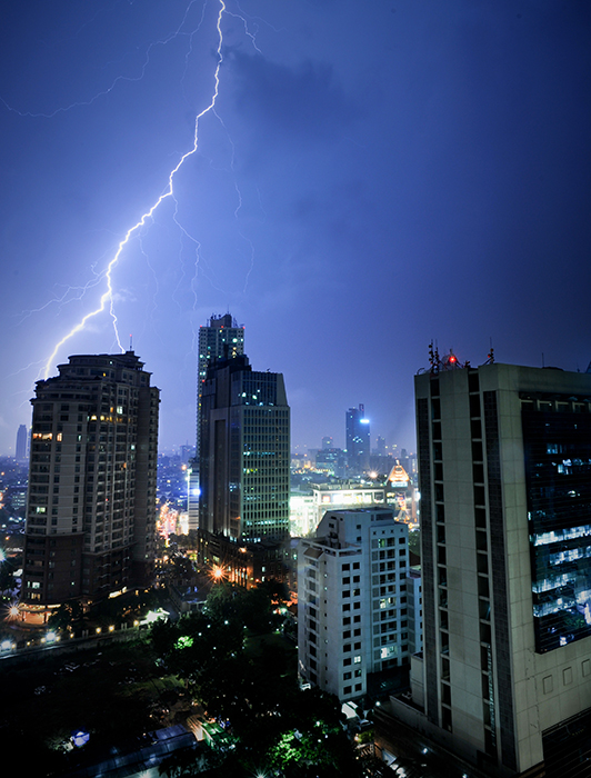 Lightning often strikes tall buildings.