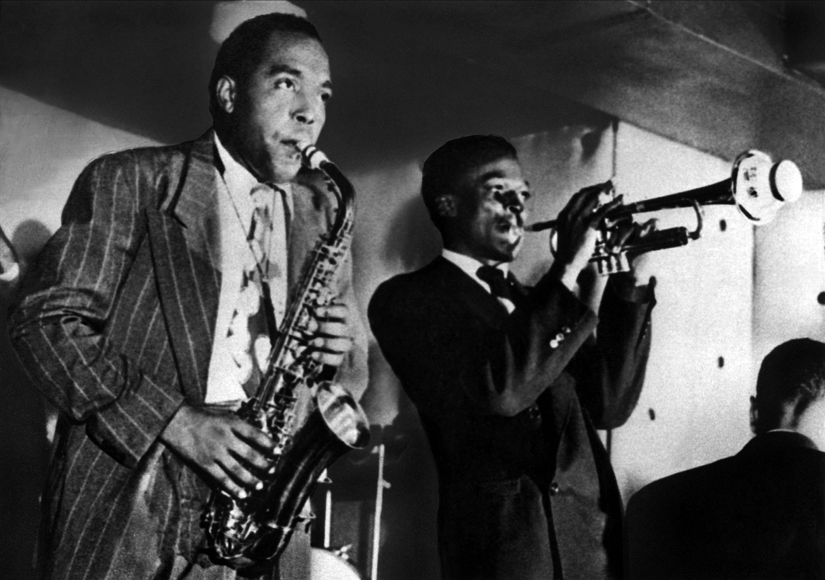 Charlie Parker (on saxophone) and Miles Davis (on trumpet) in 1945