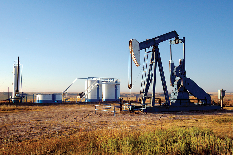 Oil well and storage tanks in Texas