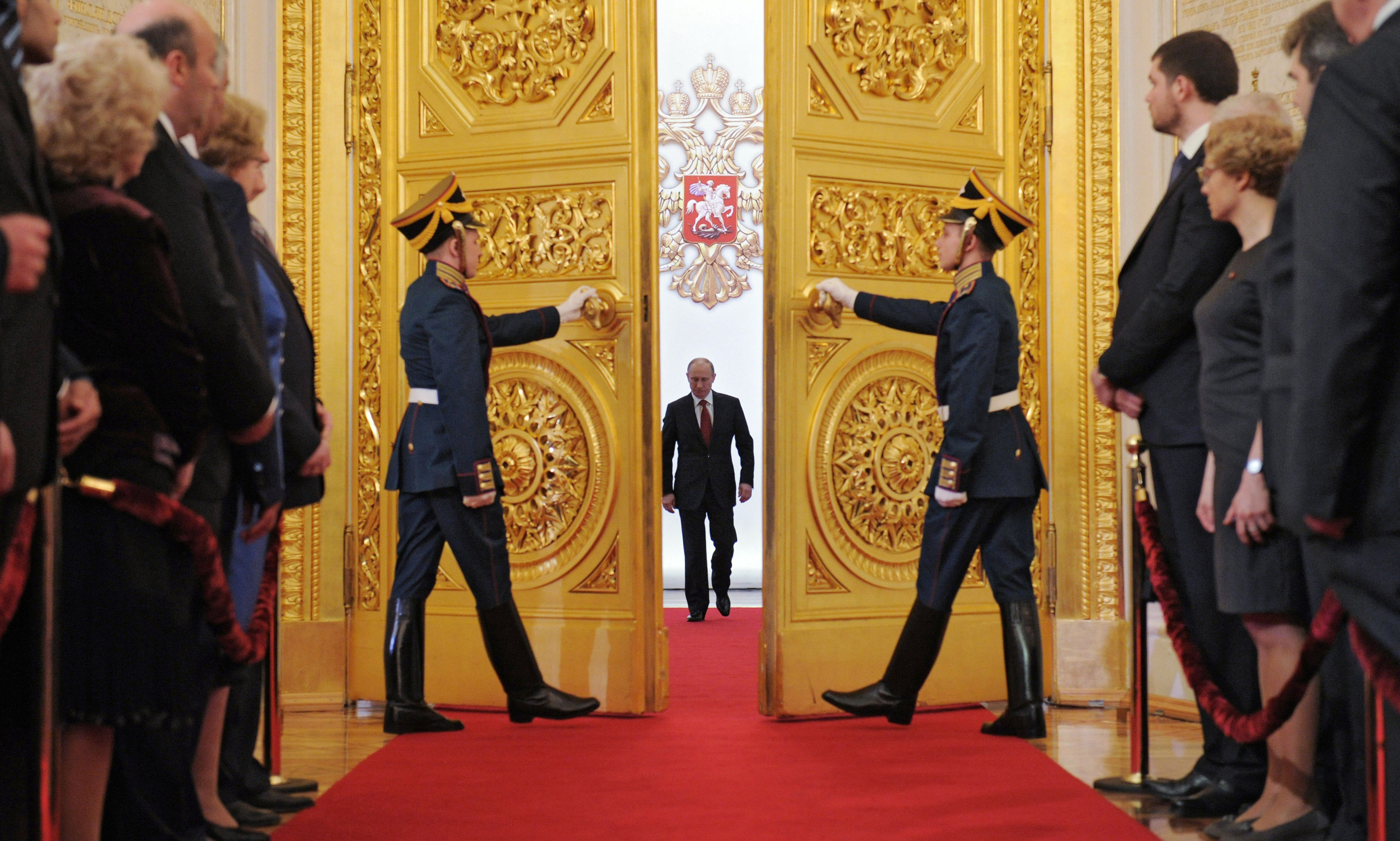 Vladimir Putin enters St. Andrew's Hall in Moscow, Russia