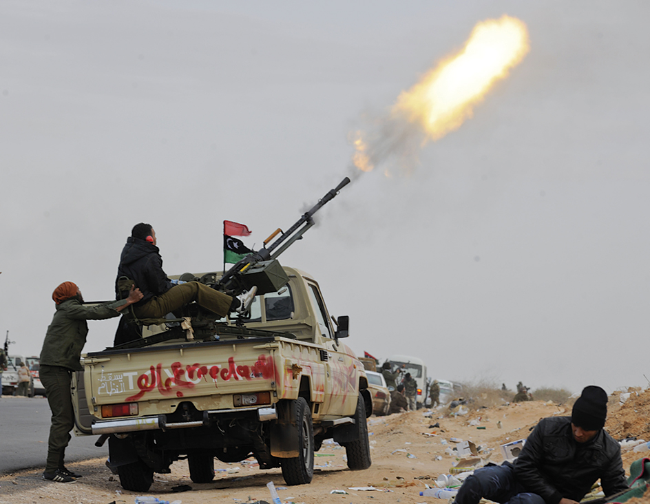 Rebels firing an antiaircraft gun