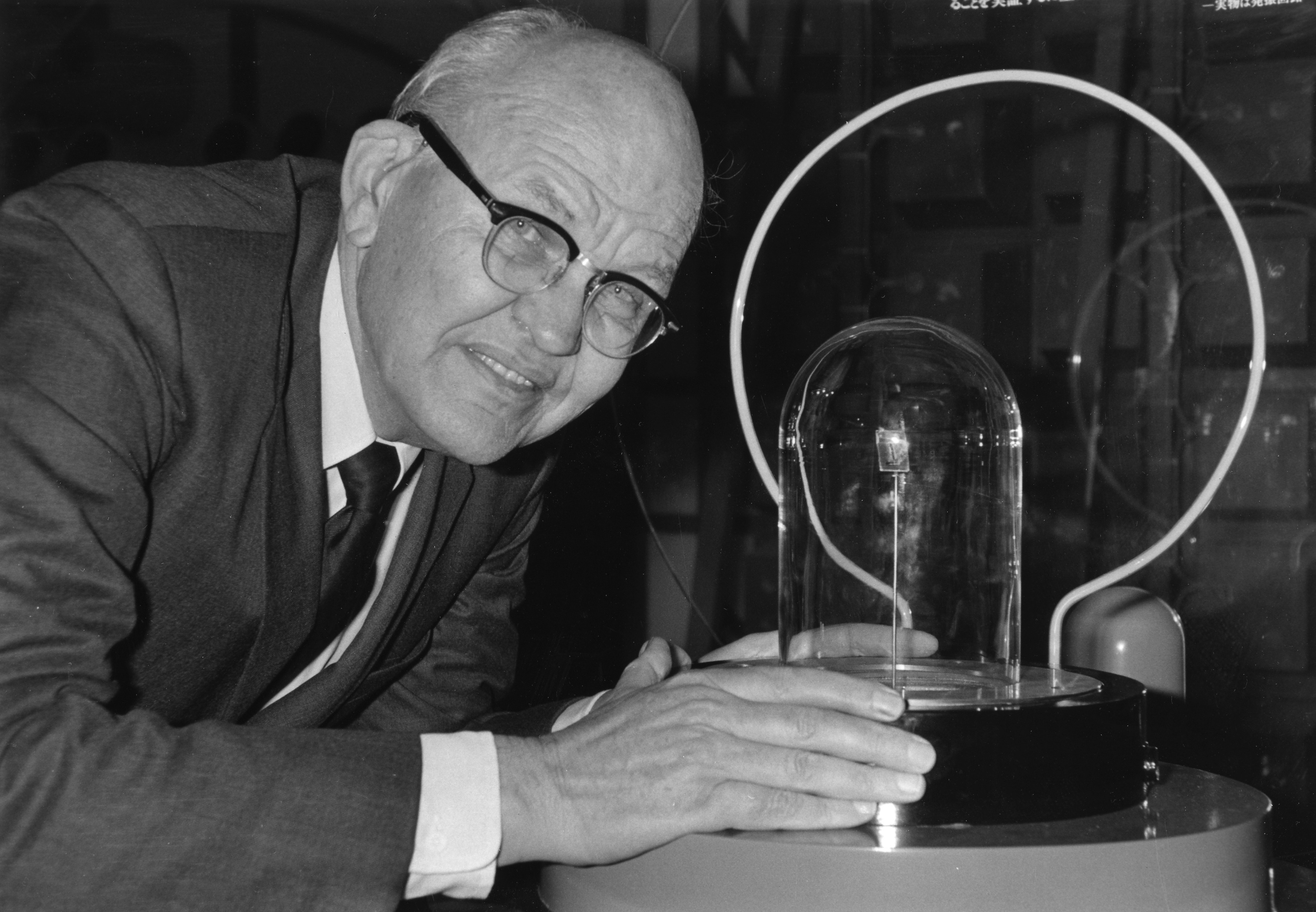 Inventor Jack Kilby with his integrated circuit, the basis for virtually all modern computer chips