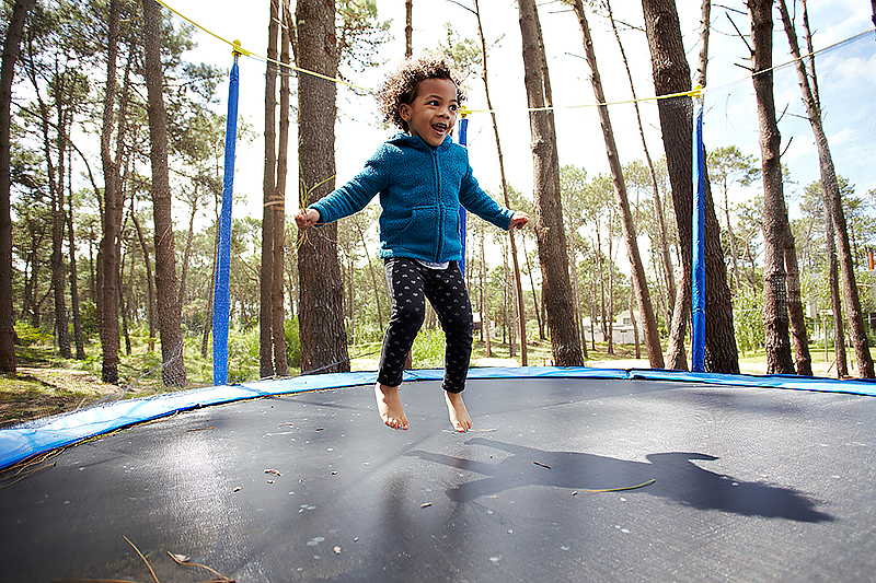 Jumping on a trampoline