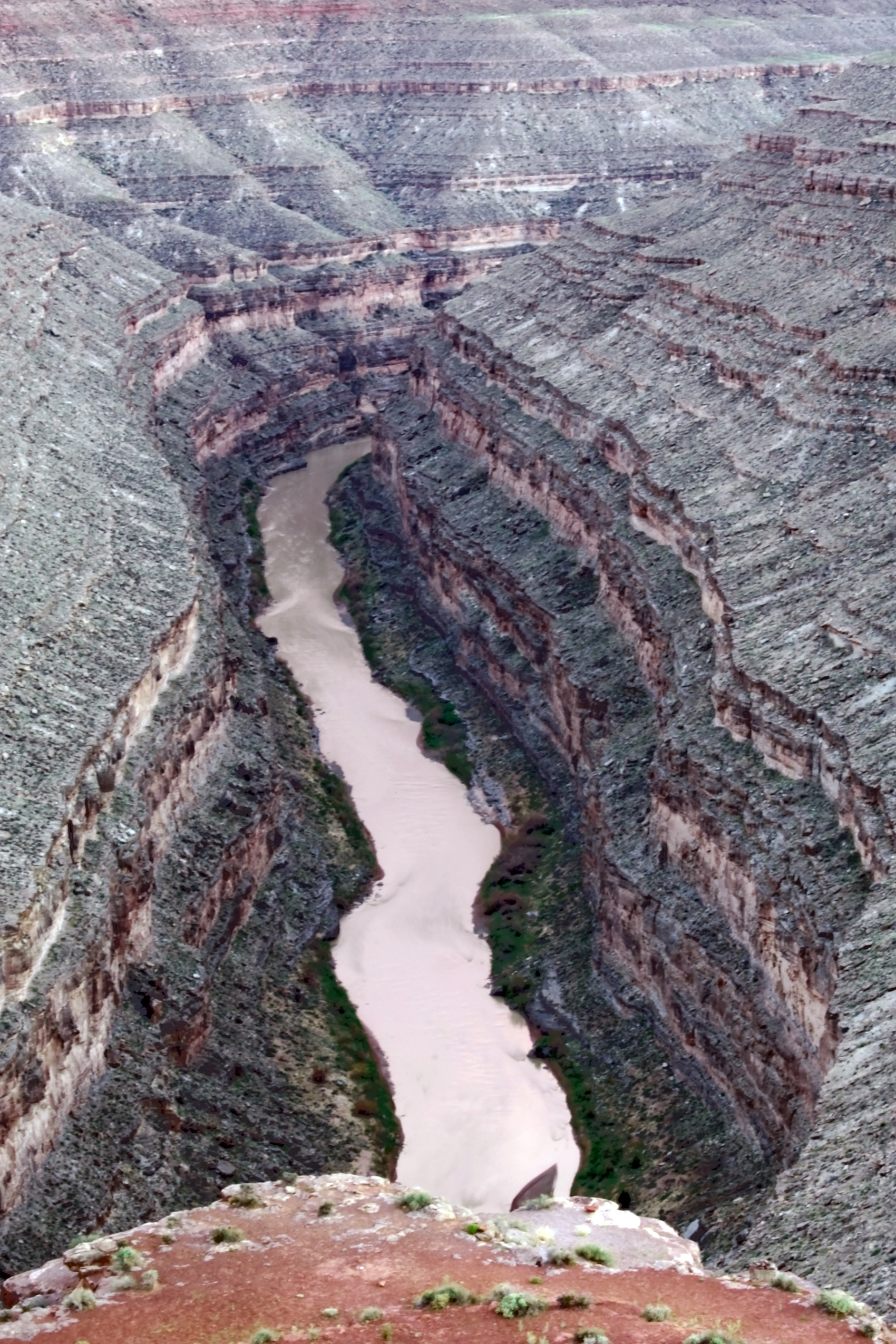 Flowing water erodes rocks