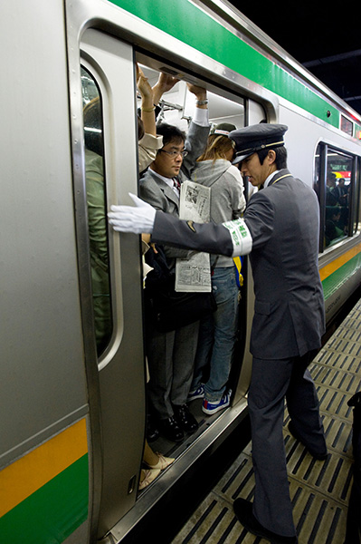 Train attendants in Tokyo