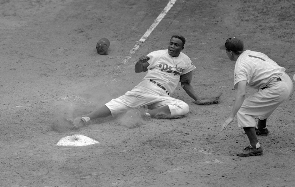 Jackie Robinson slides into home plate