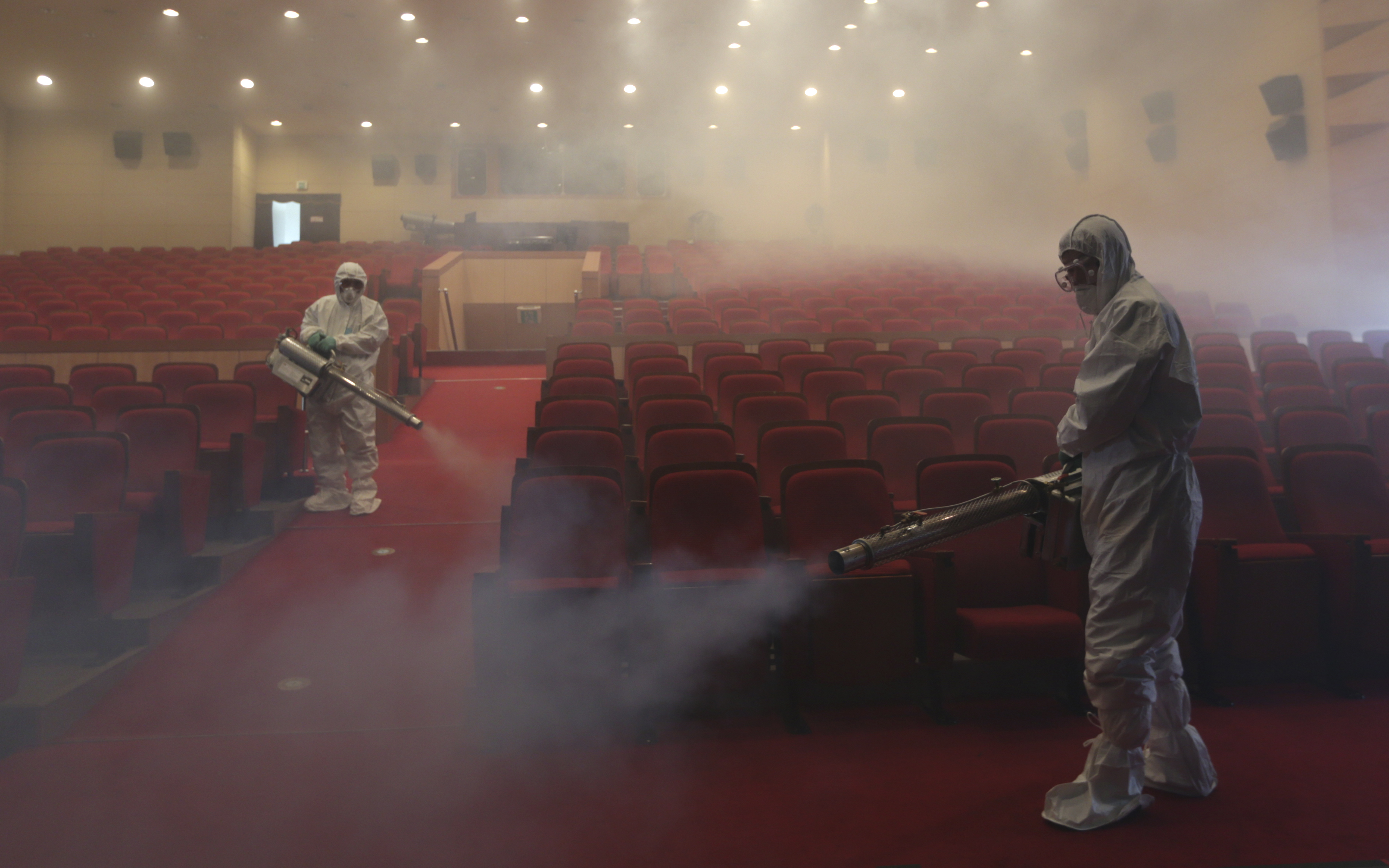 Workers fighting an outbreak of the respiratory disease MERS in South Korea