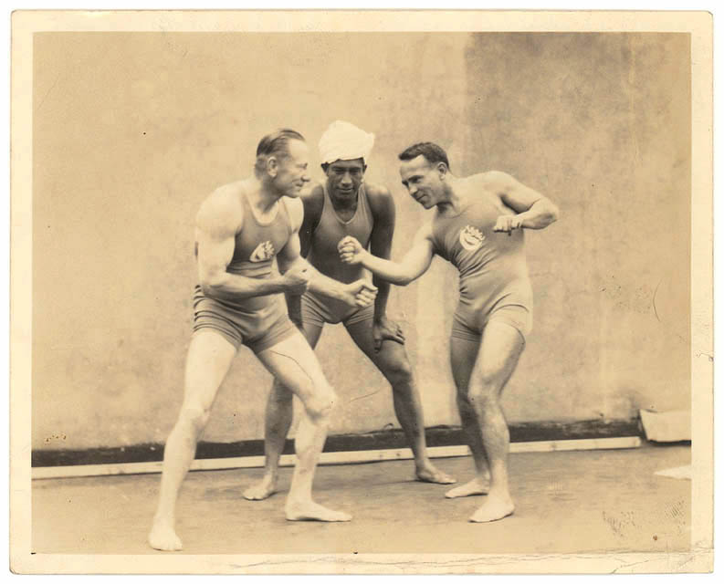 Australian sportsman and showman Snowy Baker (at left)