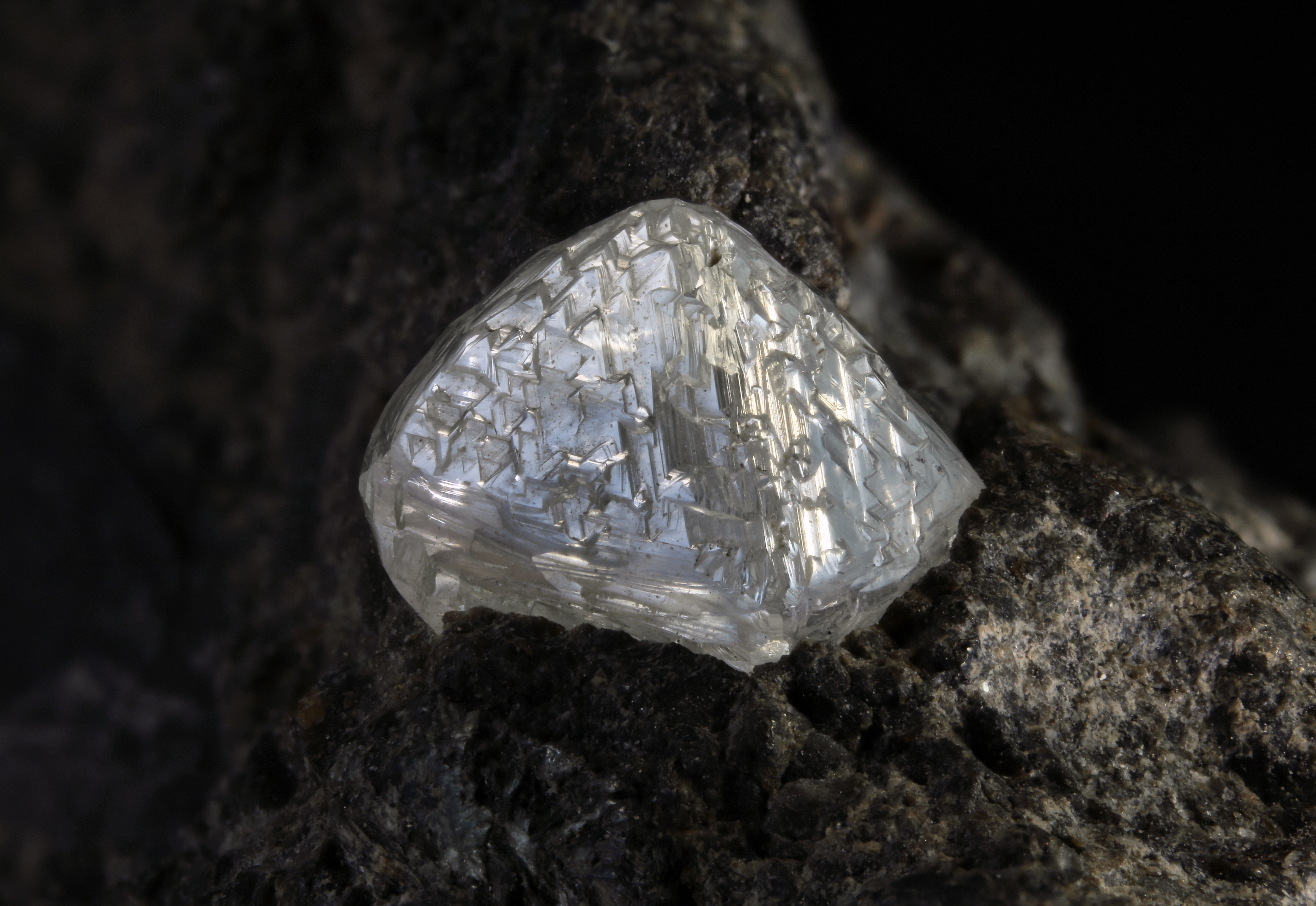 Naturally occurring diamond embedded in the rock kimberlite