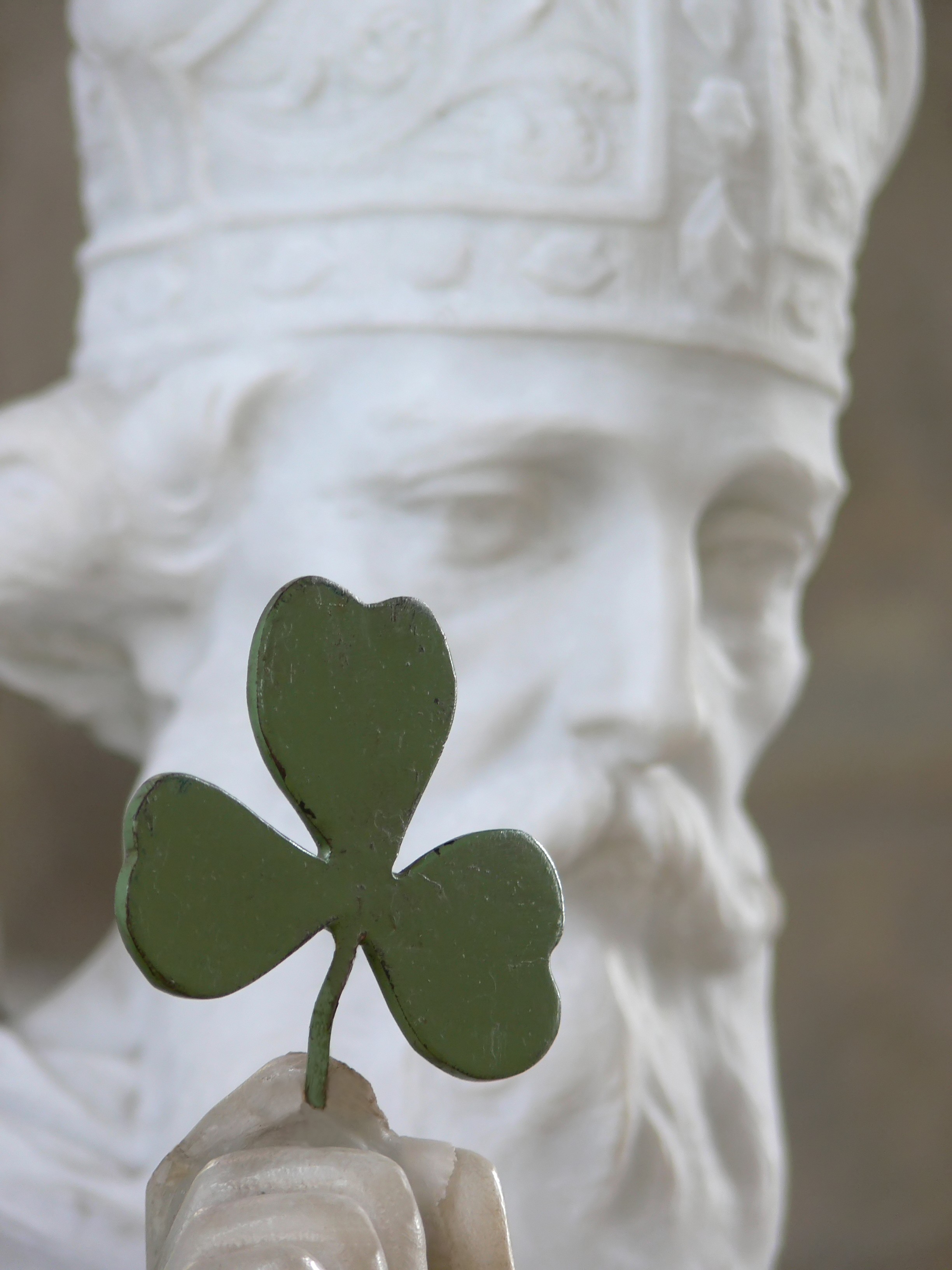 Statue of Saint Patrick with shamrock