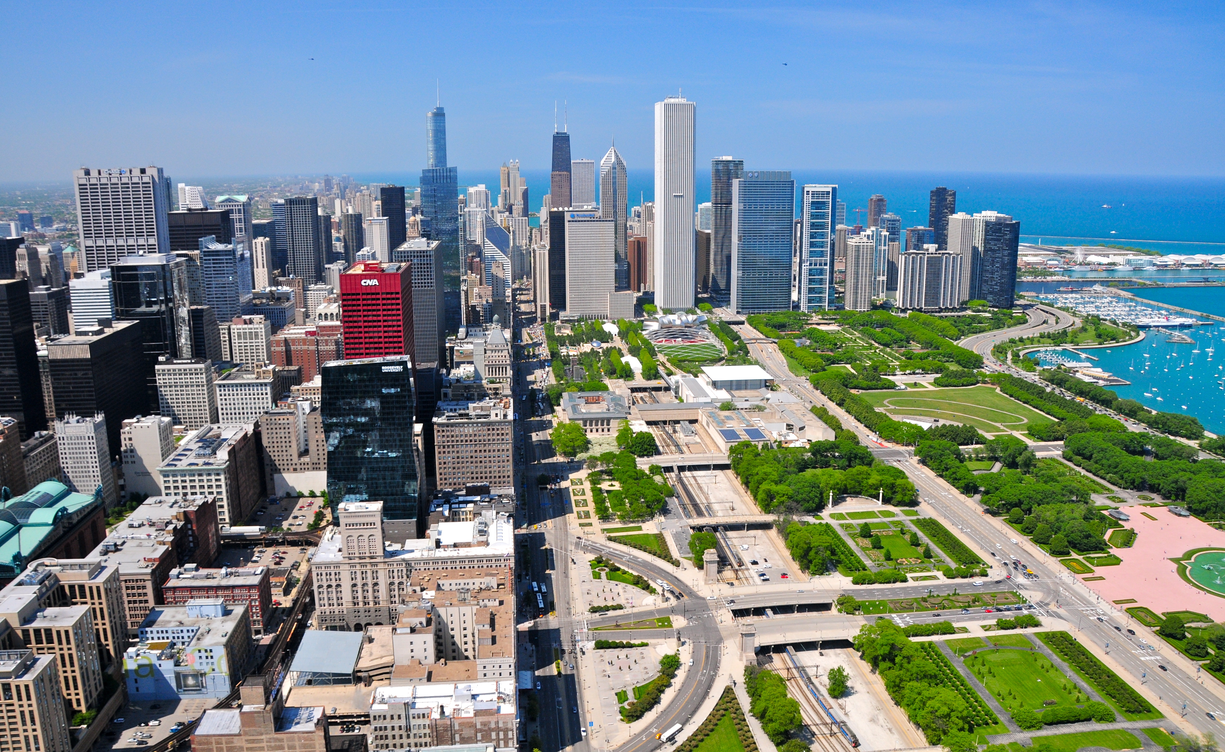 The city of Chicago, in northeastern Illinois, rises along the shores of Lake Michigan