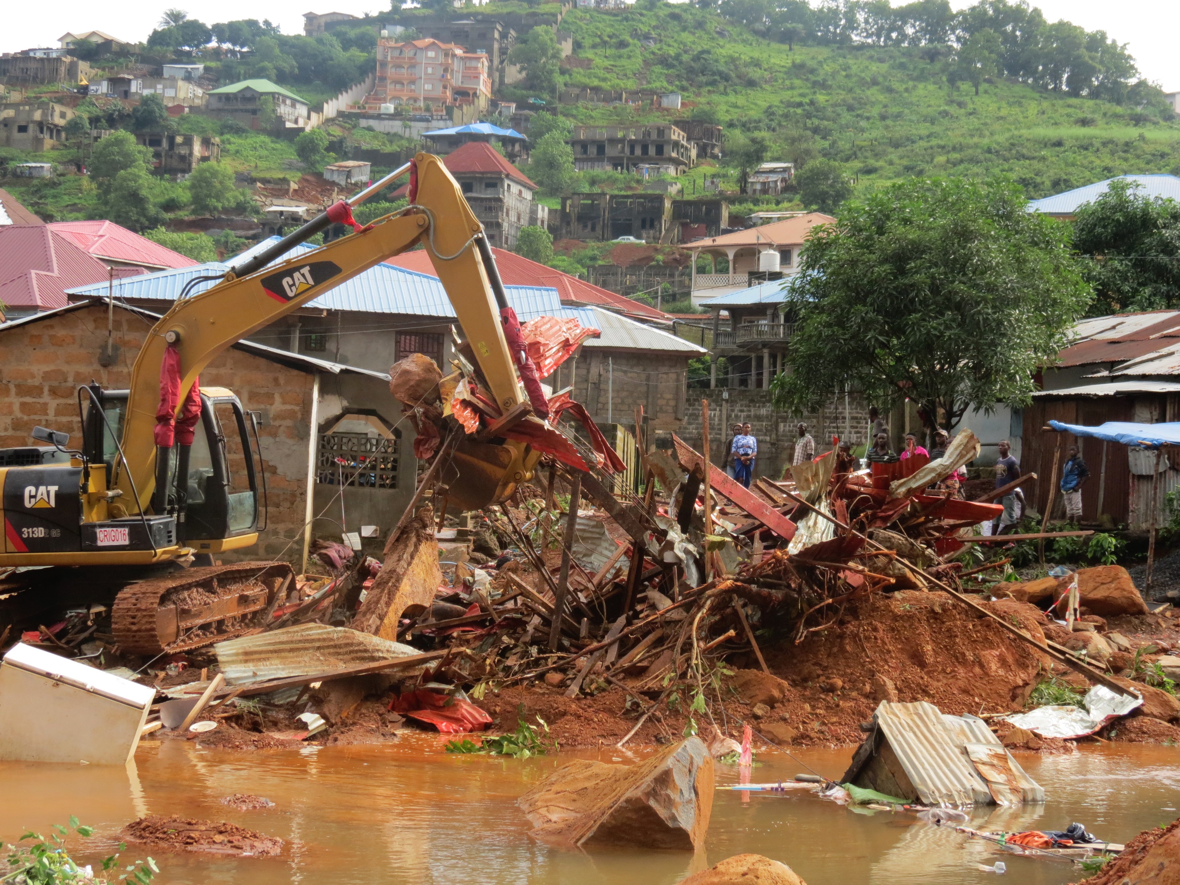 Cleaning up after a disastrous mudslide in Sierra Leone