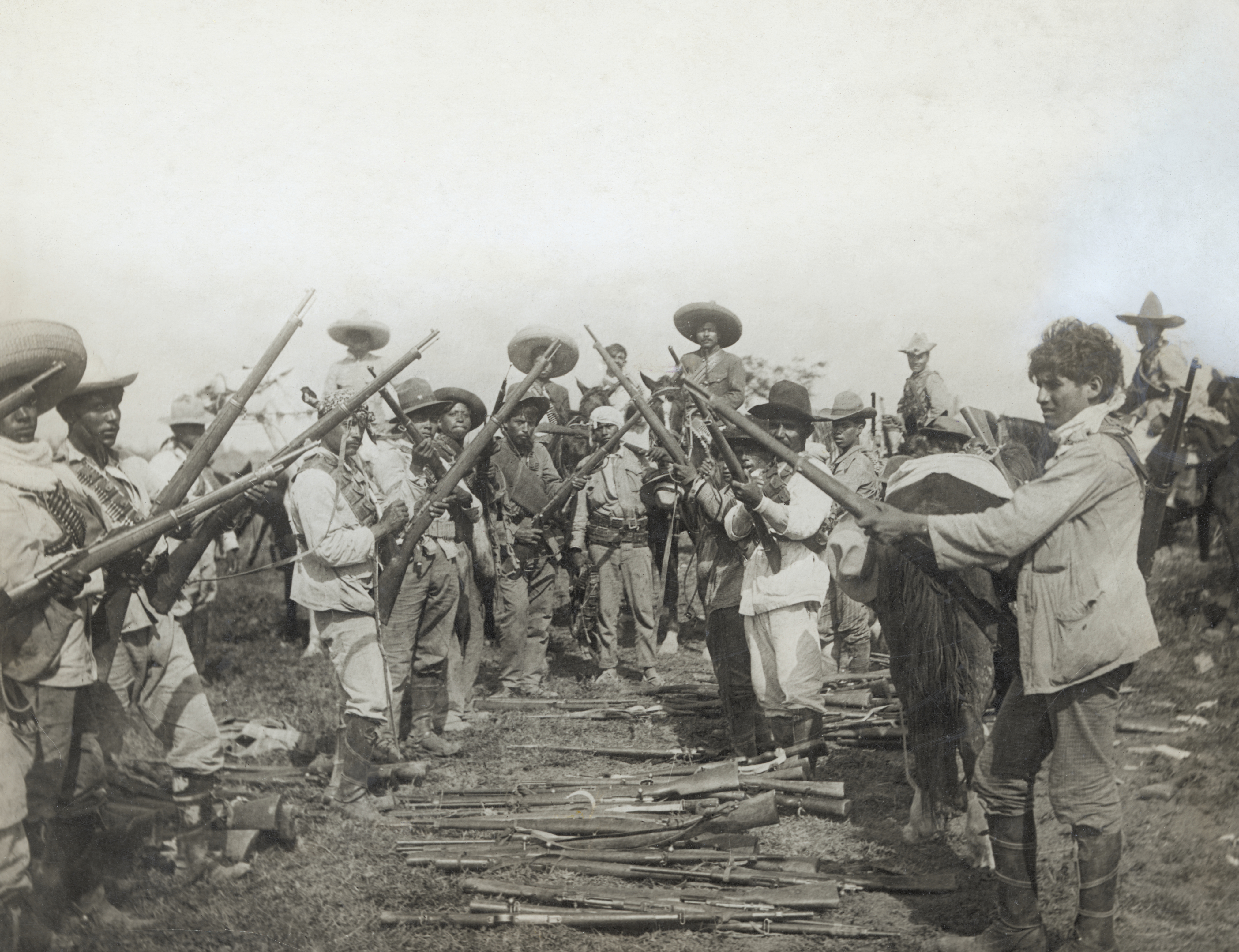 Troops display seized arms, Mexican Revolution of 1910