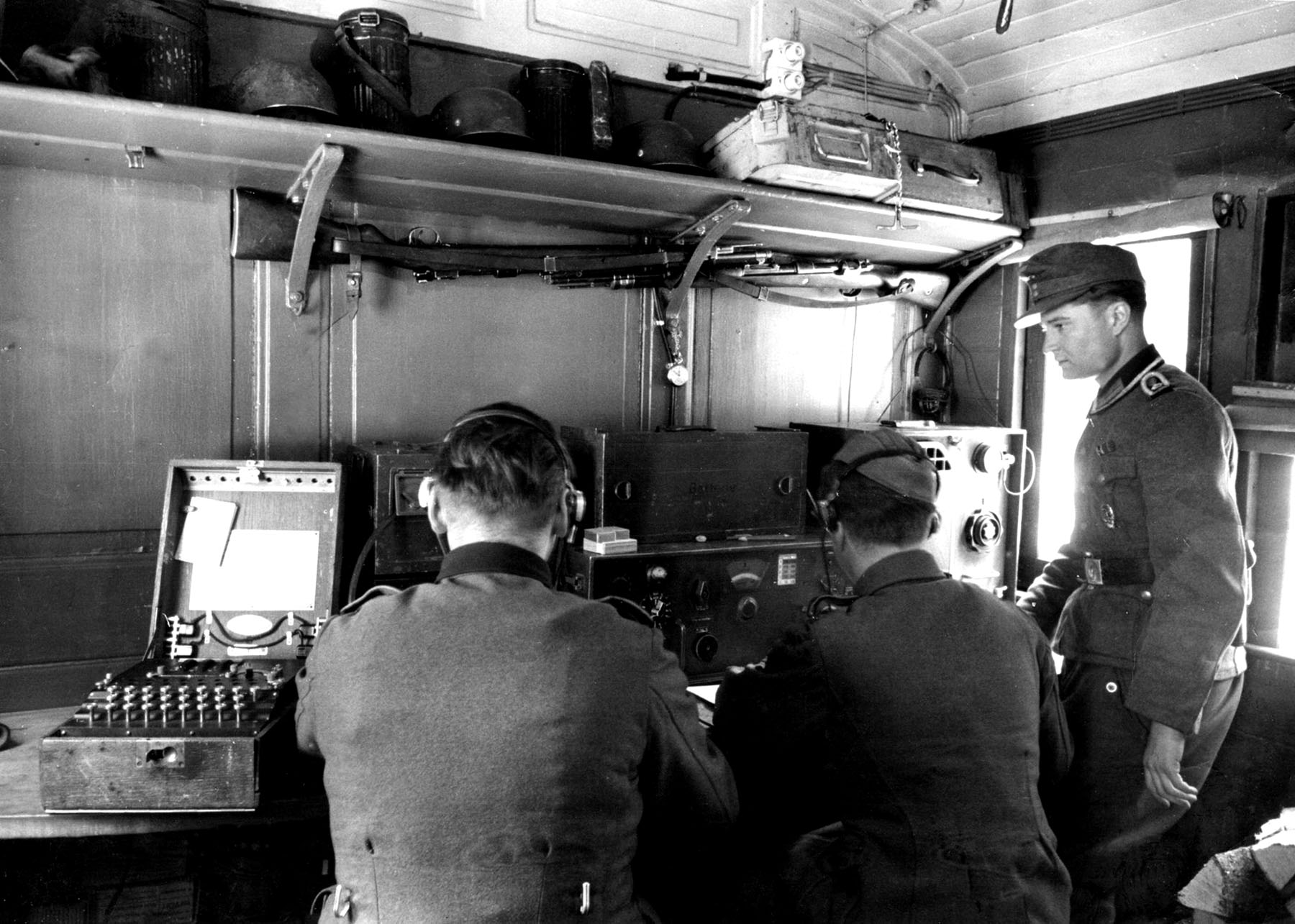 An Enigma machine (shown on the left) during World War II