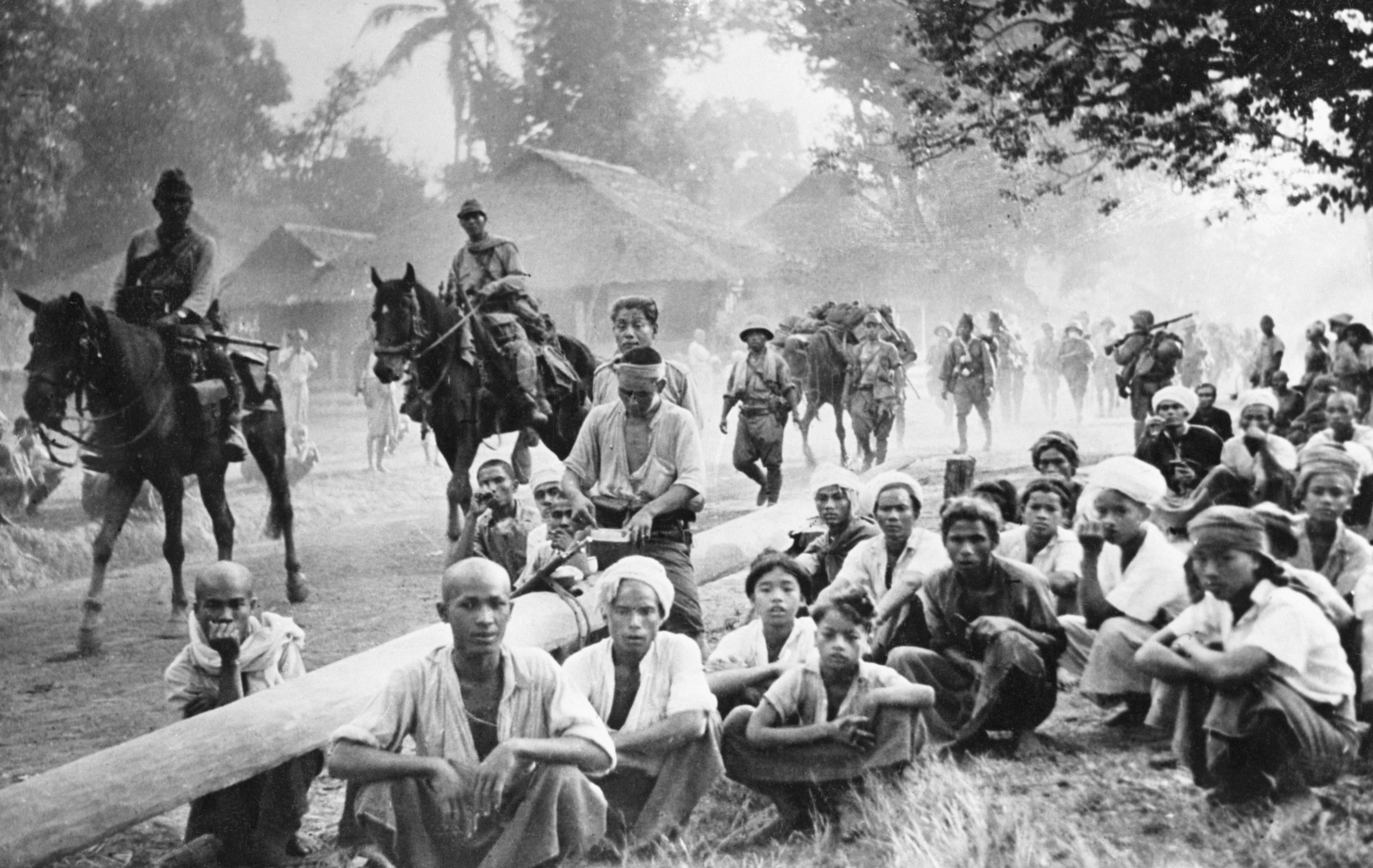 Japanese troops march through Burma (now Myanmar), 1942