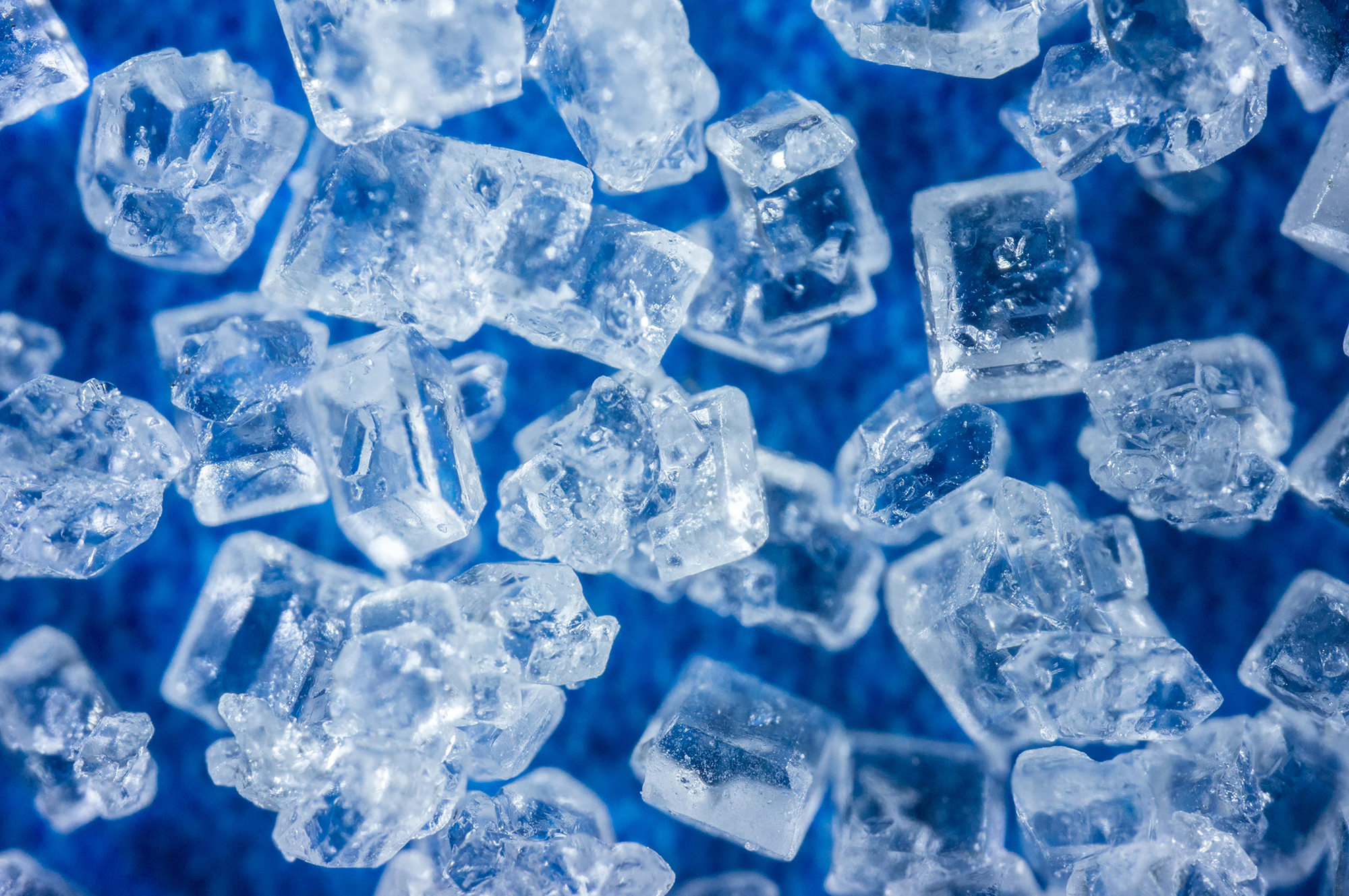 Salt crystals form nearly perfect cubes.