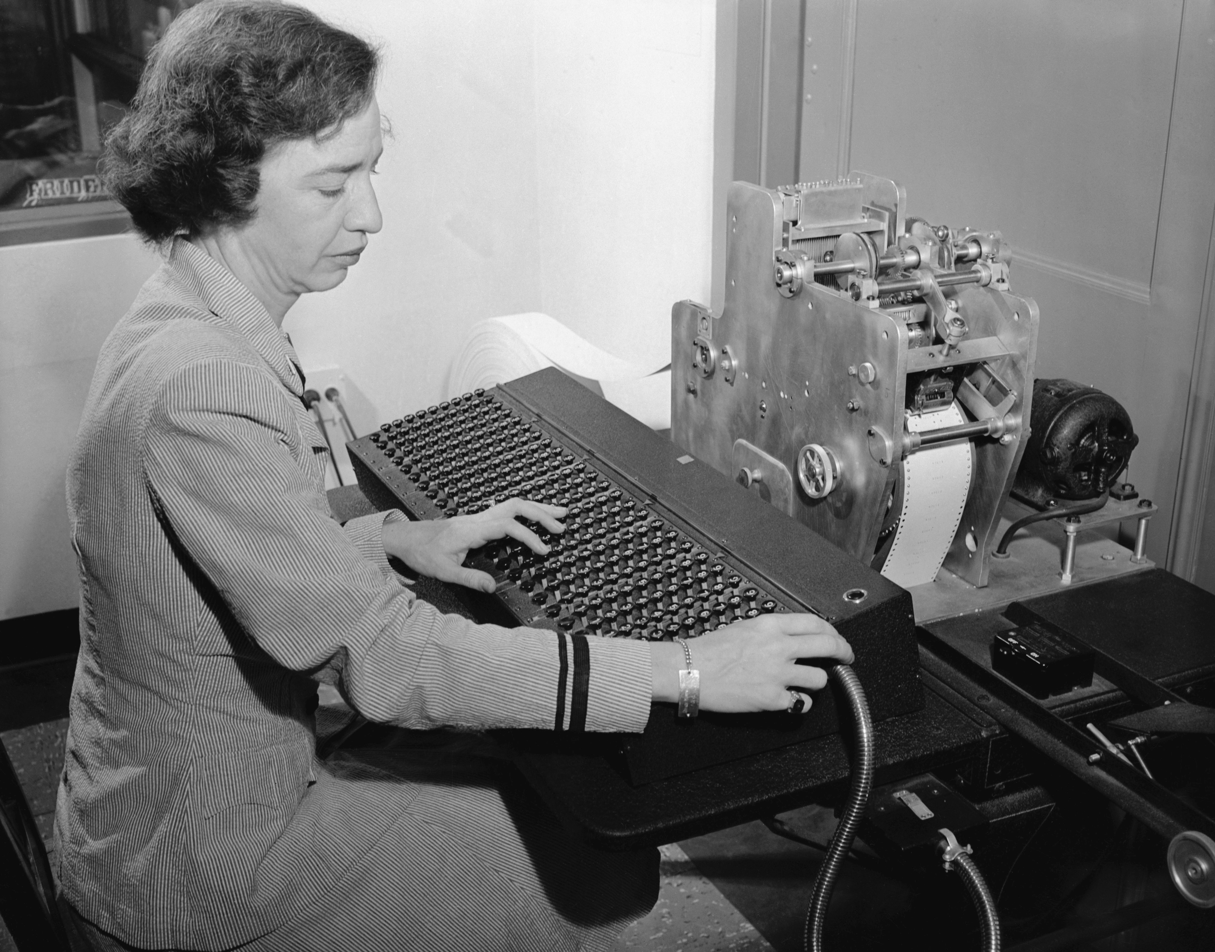 American computer scientist Grace Hopper using the Mark 1 computer