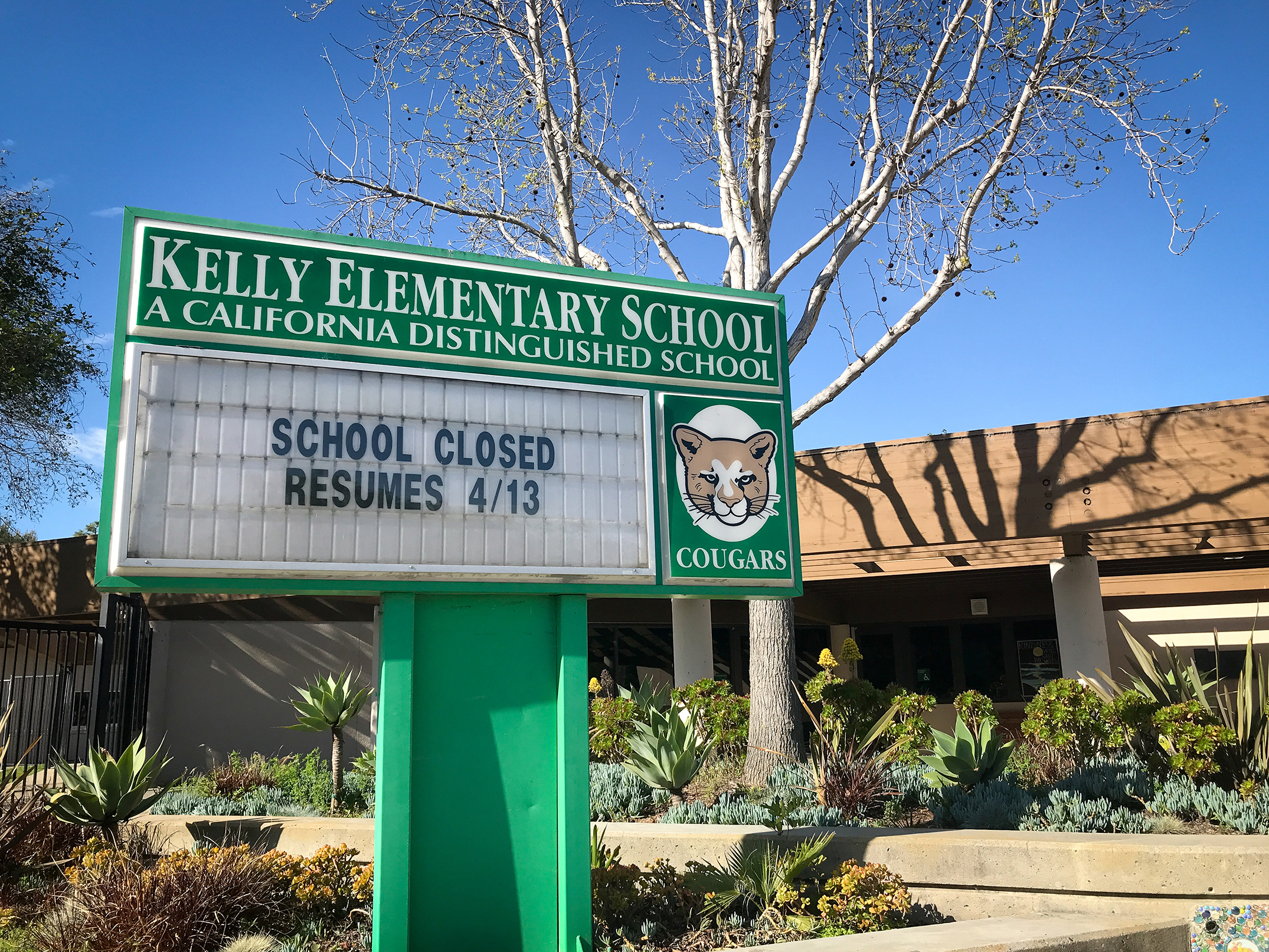 Sign announcing a school closure due to COVID-19